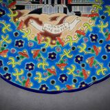 Longwy plate with polychrome enamels, decorated with the "City of Iron" motif.