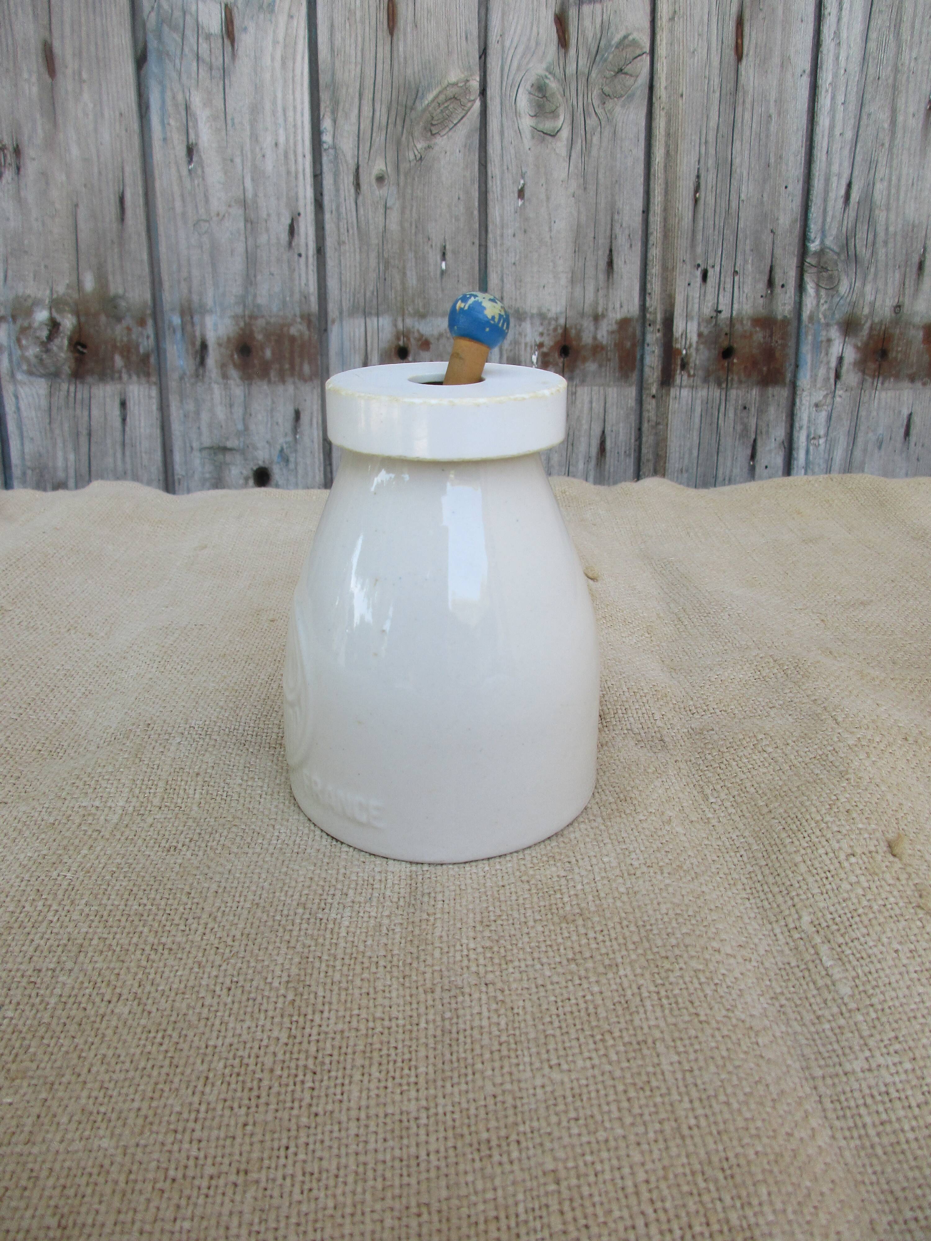 Old mustard pot in gres