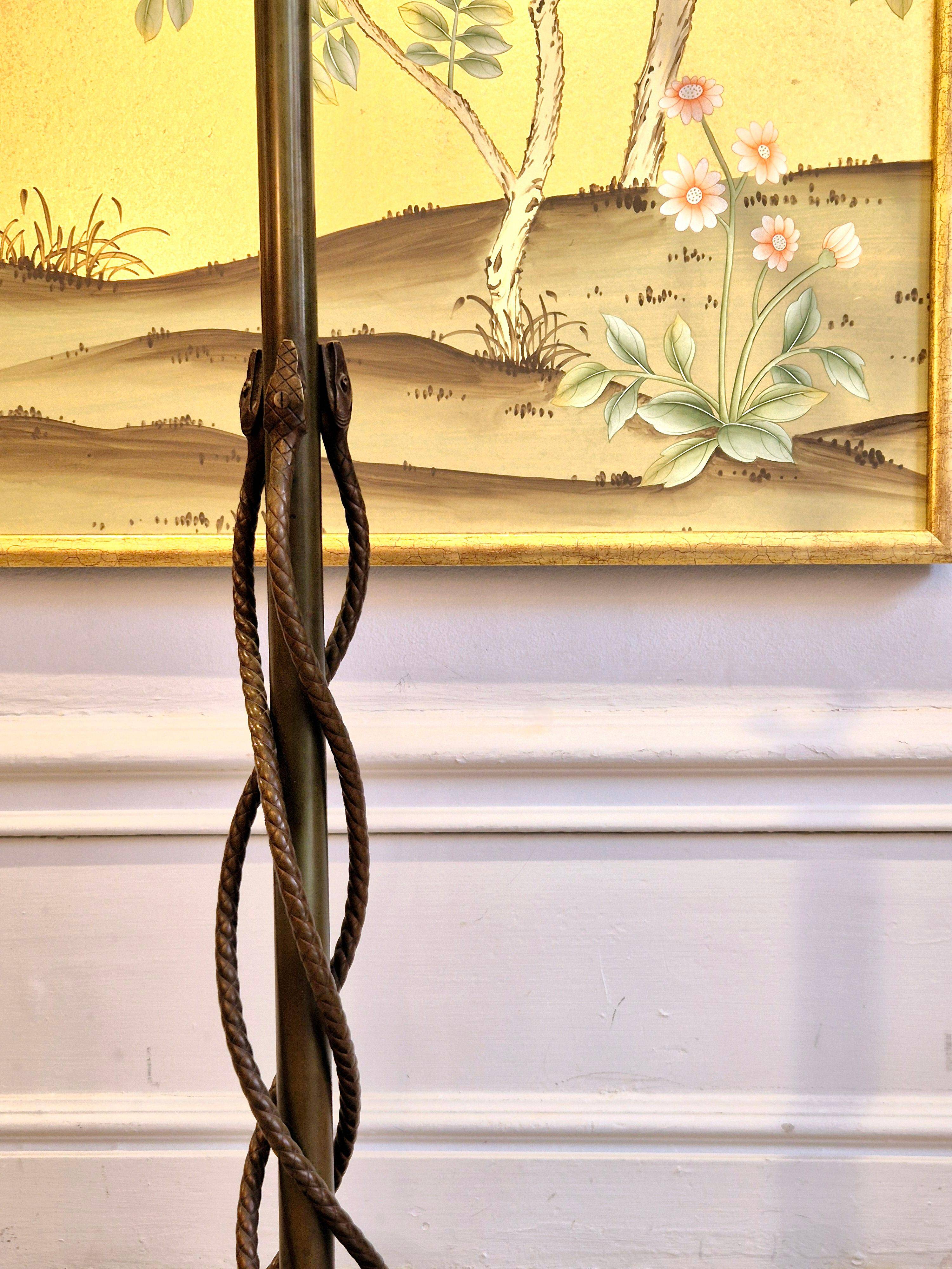 Rare and exquisite bronze floor lamp with intertwined snakes, early 1900s.