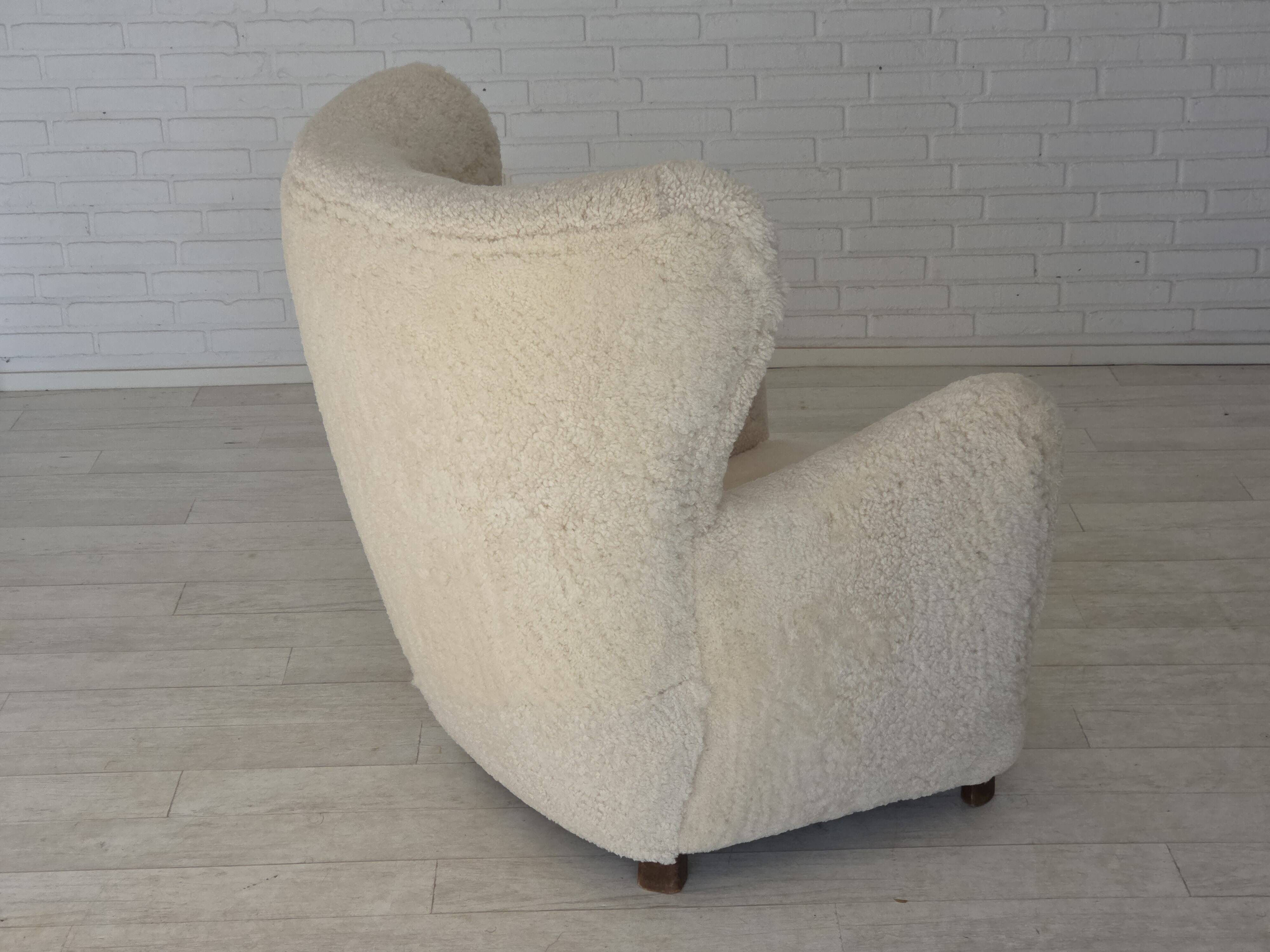 1960s, Danish armchair, genuine sheepskin "Canberra", reupholstered.
