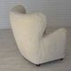 Fauteuil danois des années 1960, en véritable peau de mouton "Canberra", retapissé.