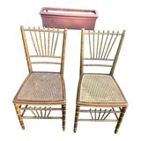 Paire de chaises cannées en bois doré