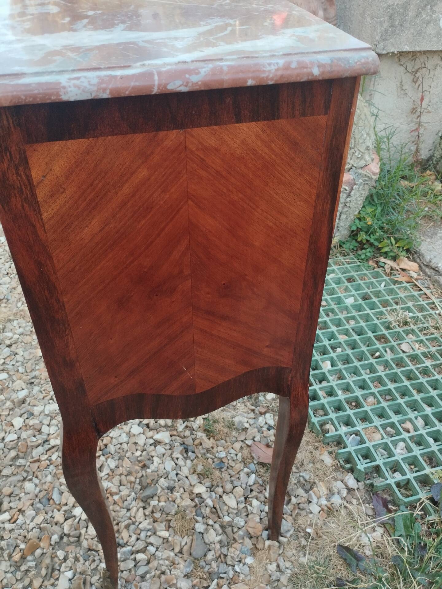 Antique marquetry commode with marble top in Louis XVI style.