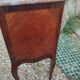 Antique marquetry commode with marble top in Louis XVI style.