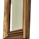 Antique mirror in gilded and copper wood