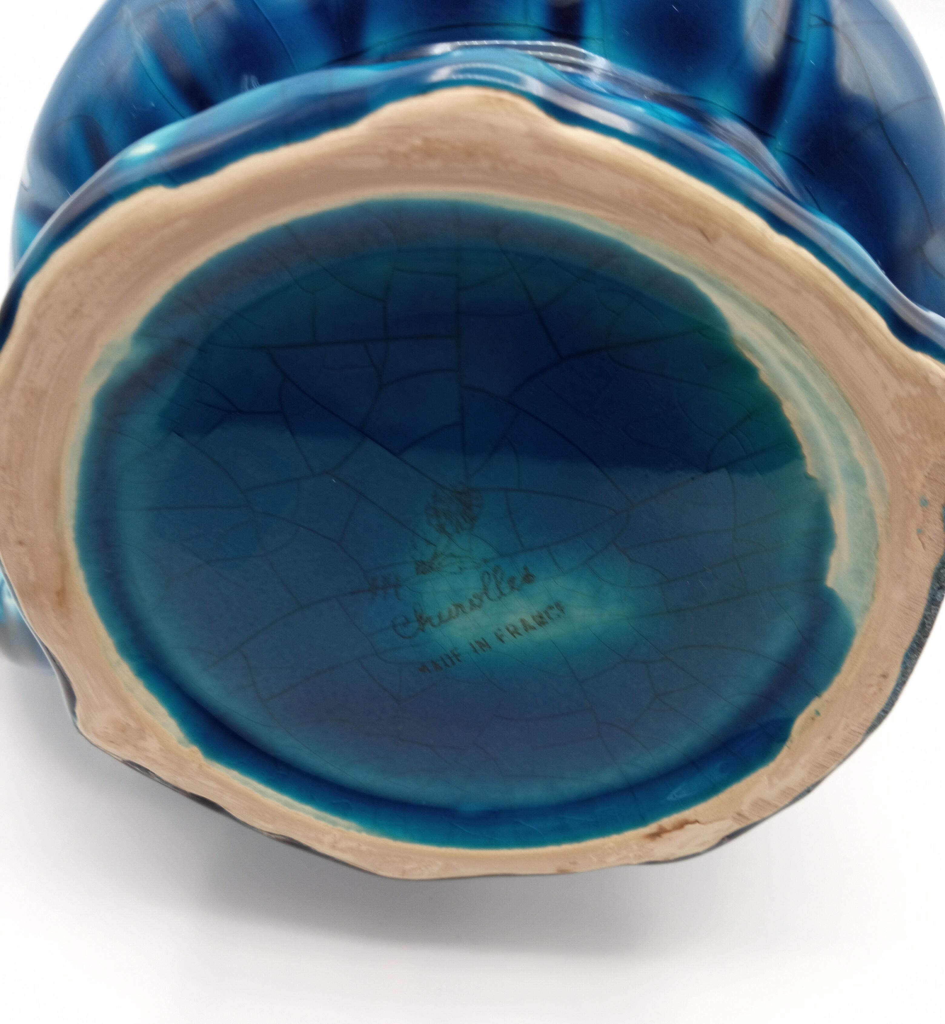 Pitcher in cracked blue Charolles earthenware