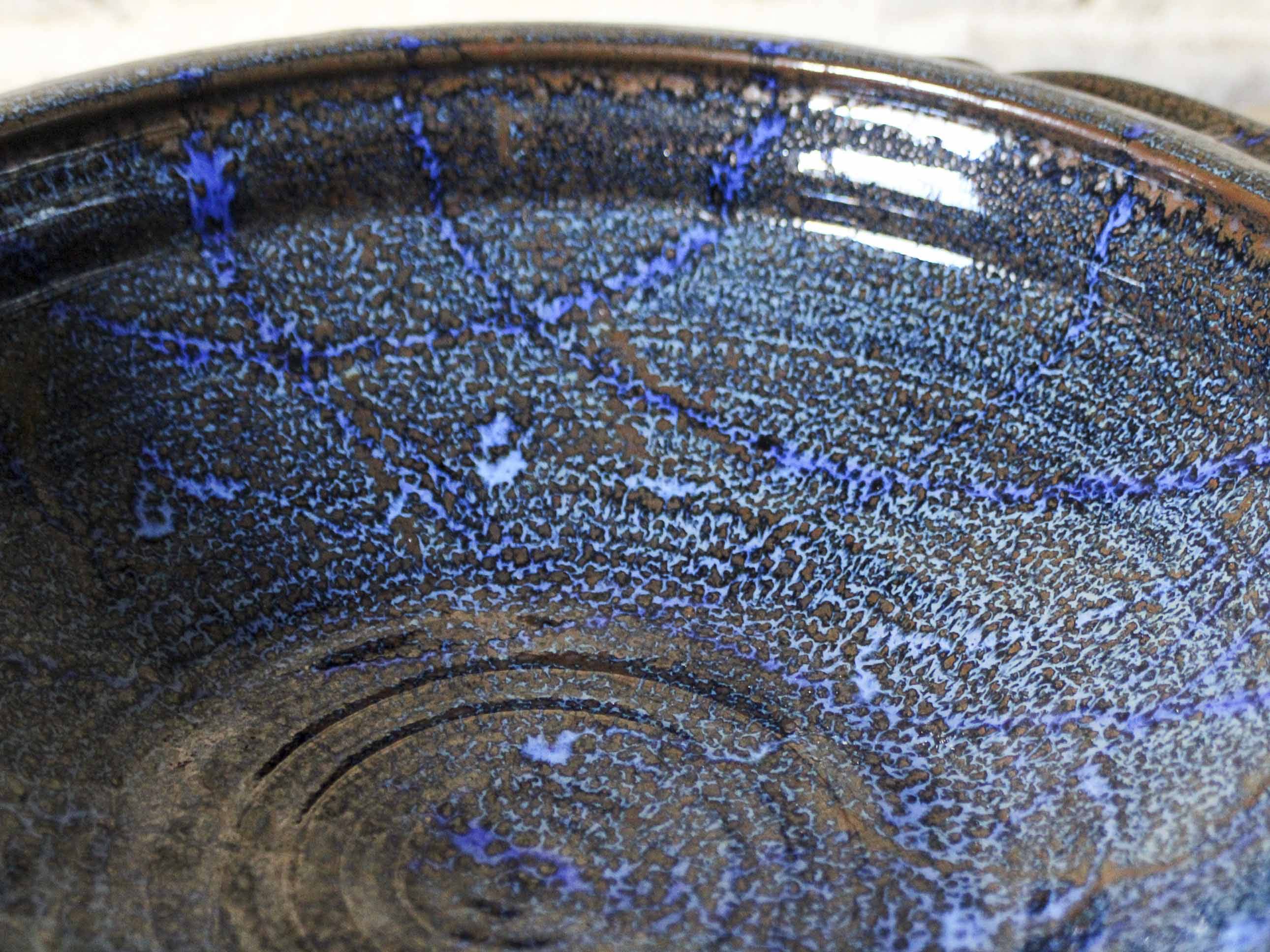 Enamelled ceramic hollow dish signed