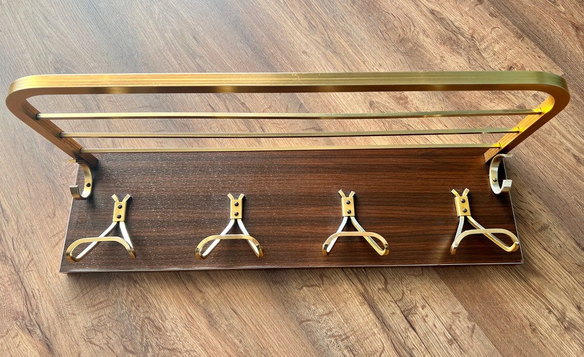 Vintage coat rack with 1970s repai décor