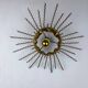Spanish sunburst ceiling light – gilt iron rays & exposed bulb, 1960s