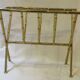 Magazine rack in the style of Jacques Adnet, bamboo model in brass.