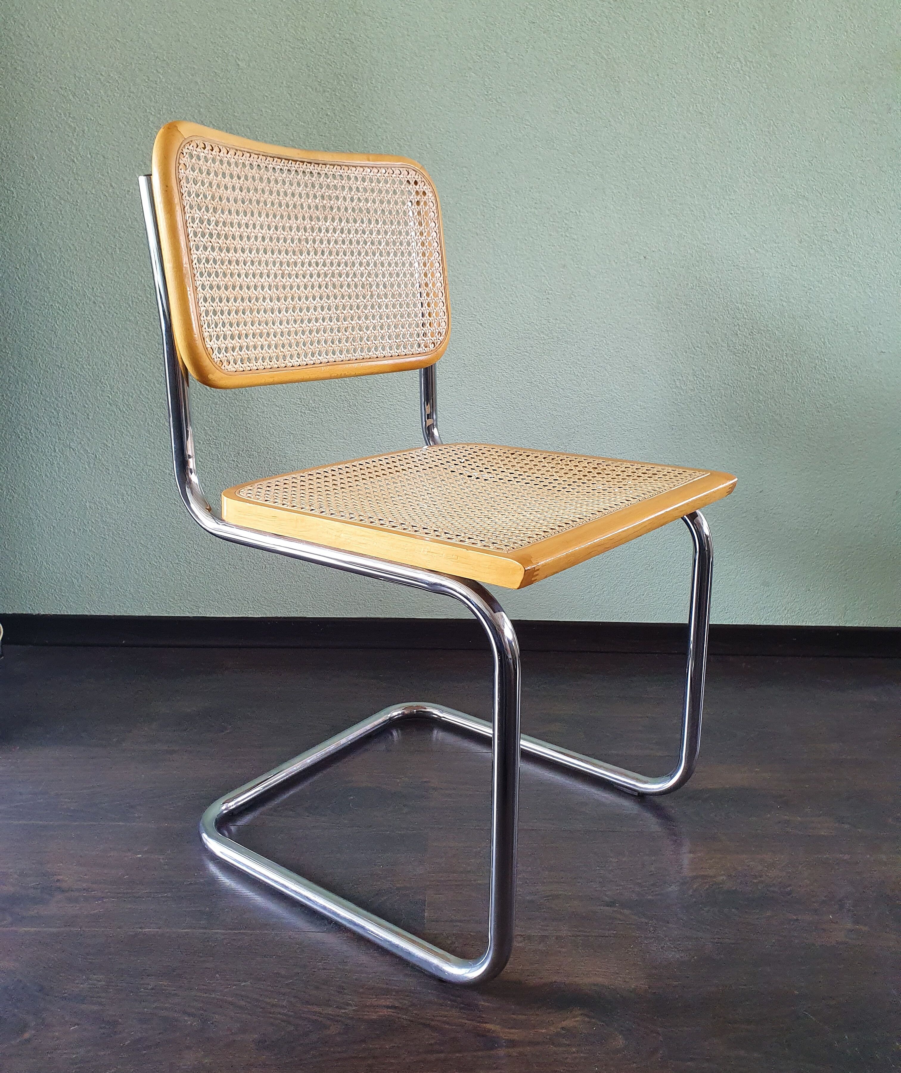 Marcel Breuer tubular frame chair with rattan seating, 70