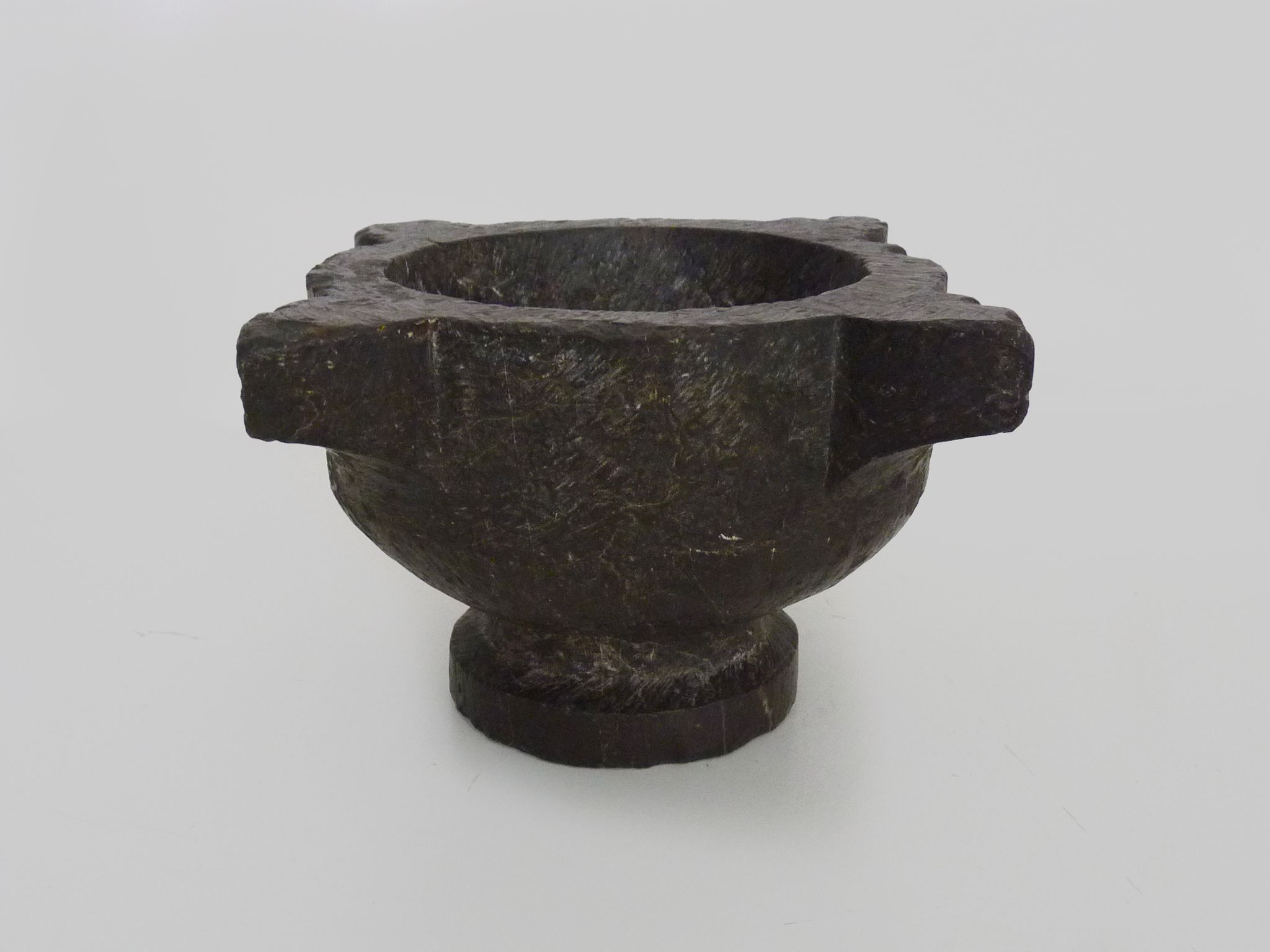 Old black marble apothecary mortar