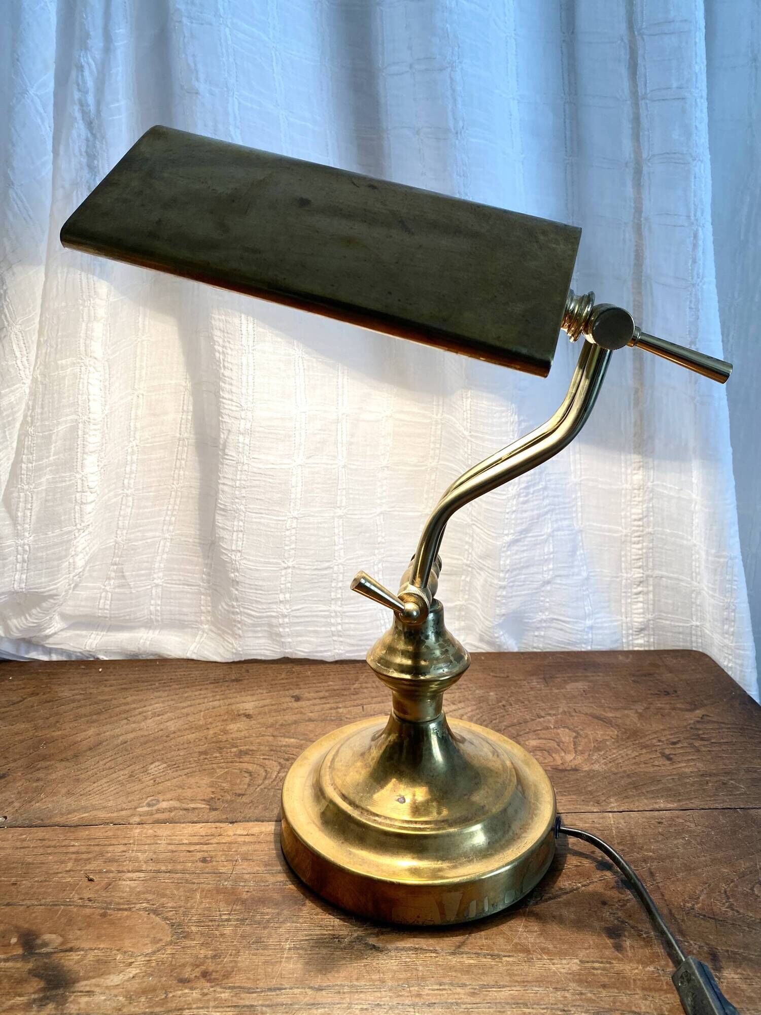 Pair of notary-style lamps in gilded metal