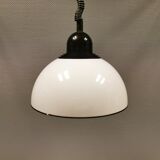 Hanging lamp, in milky white plastic with black top/suspension, probably Danish.