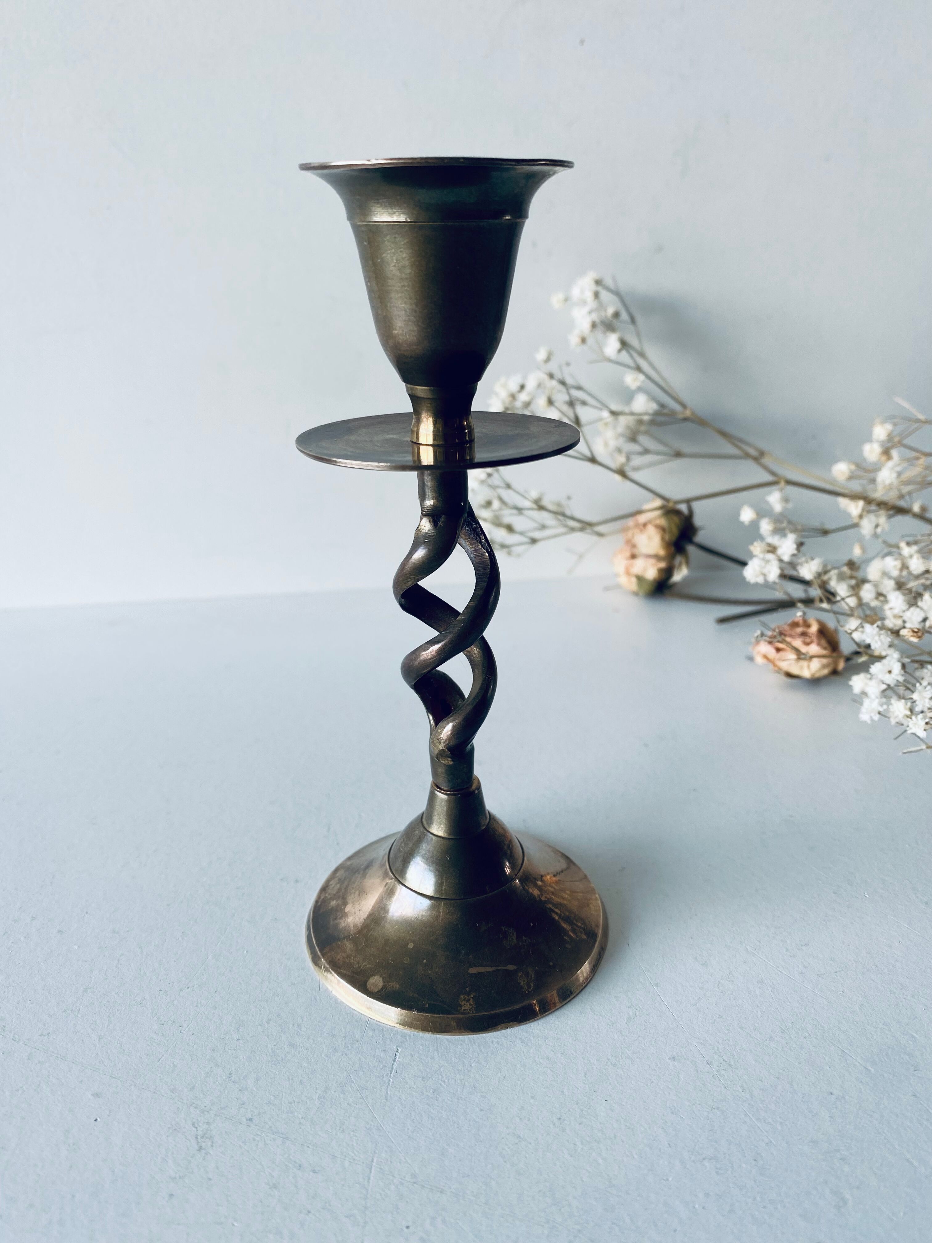 Twisted brass candle holder