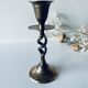 Twisted brass candle holder