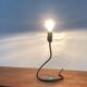 Lightworm minimalist table lamp by Walter Schnepel for Tecnolumen.