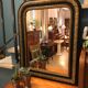 Miroir XIXè bois et stuc noirci et doré Napoléon III 49x60cm
