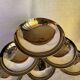 Set of 6 stainless steel ice cream bowls by Guy Degrenne with matching spoons.