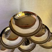 Set of 6 stainless steel ice cream bowls by Guy Degrenne with matching spoons.