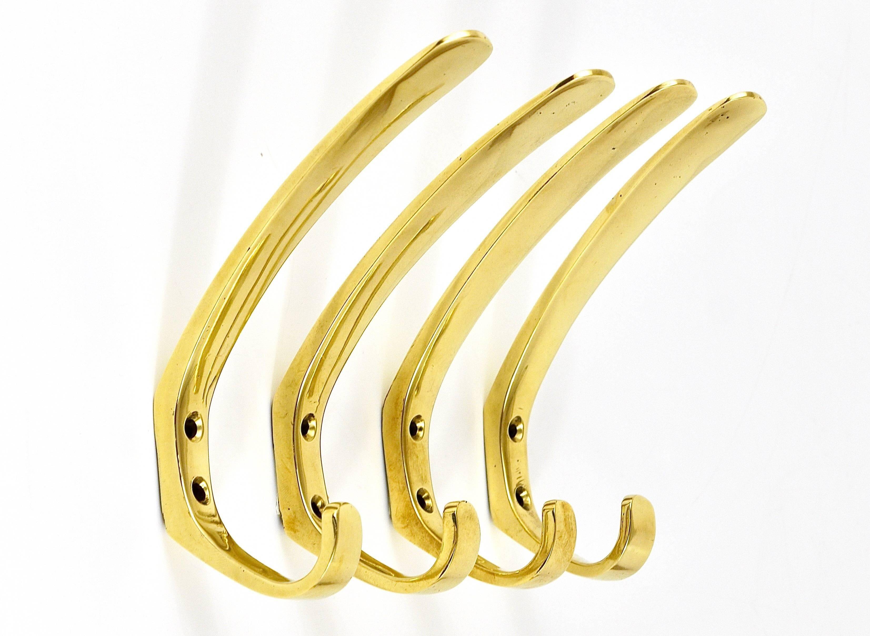 Up to four mid-century brass wall hooks by Herta Baller, Austria, 1950s.