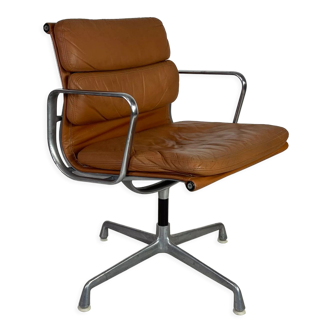 Eames light brown leather Soft Pad Group chair made by Herman Miller