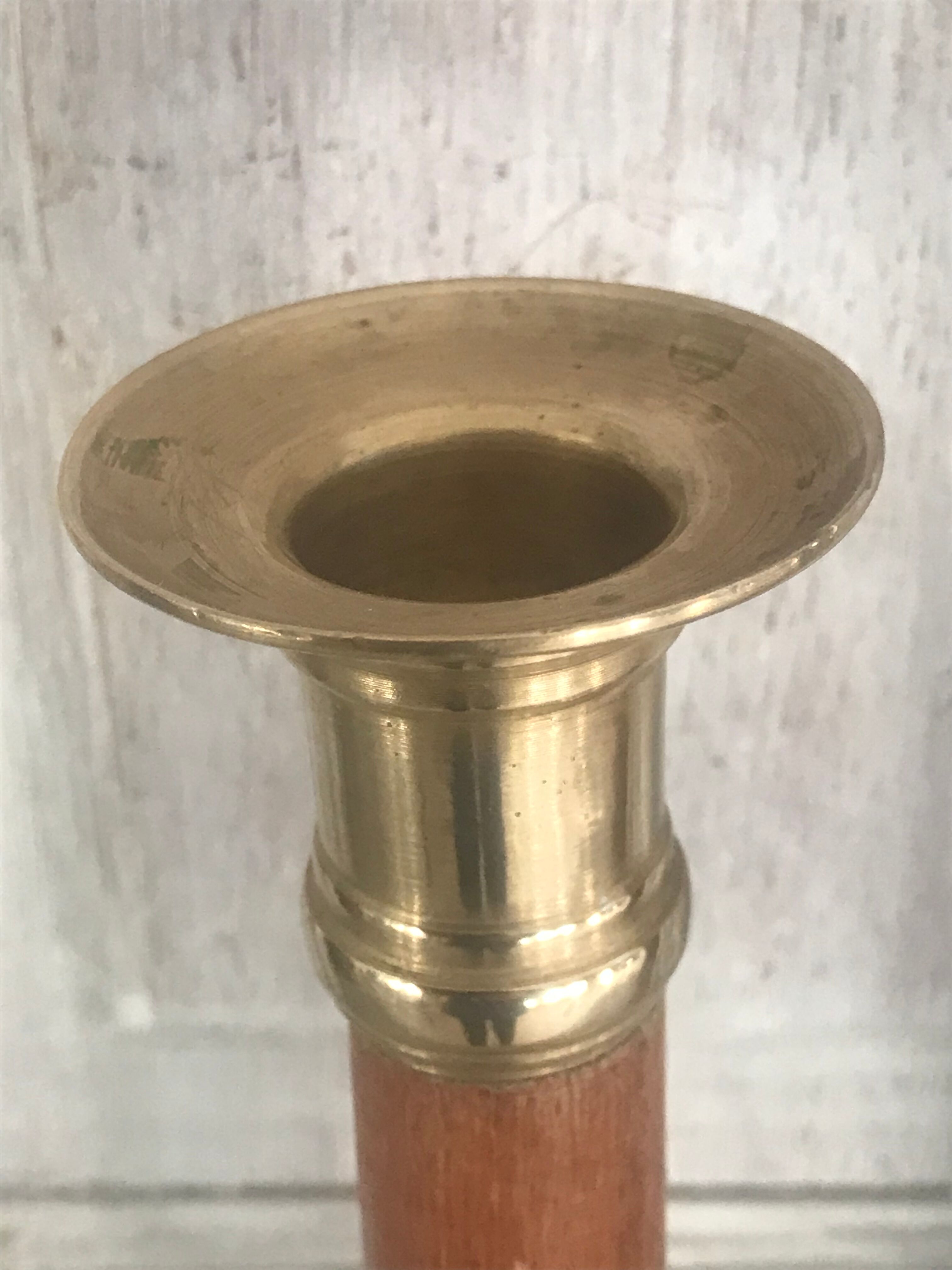 Pair of wood and brass candle holders