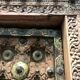 Old crafted teak and brass door