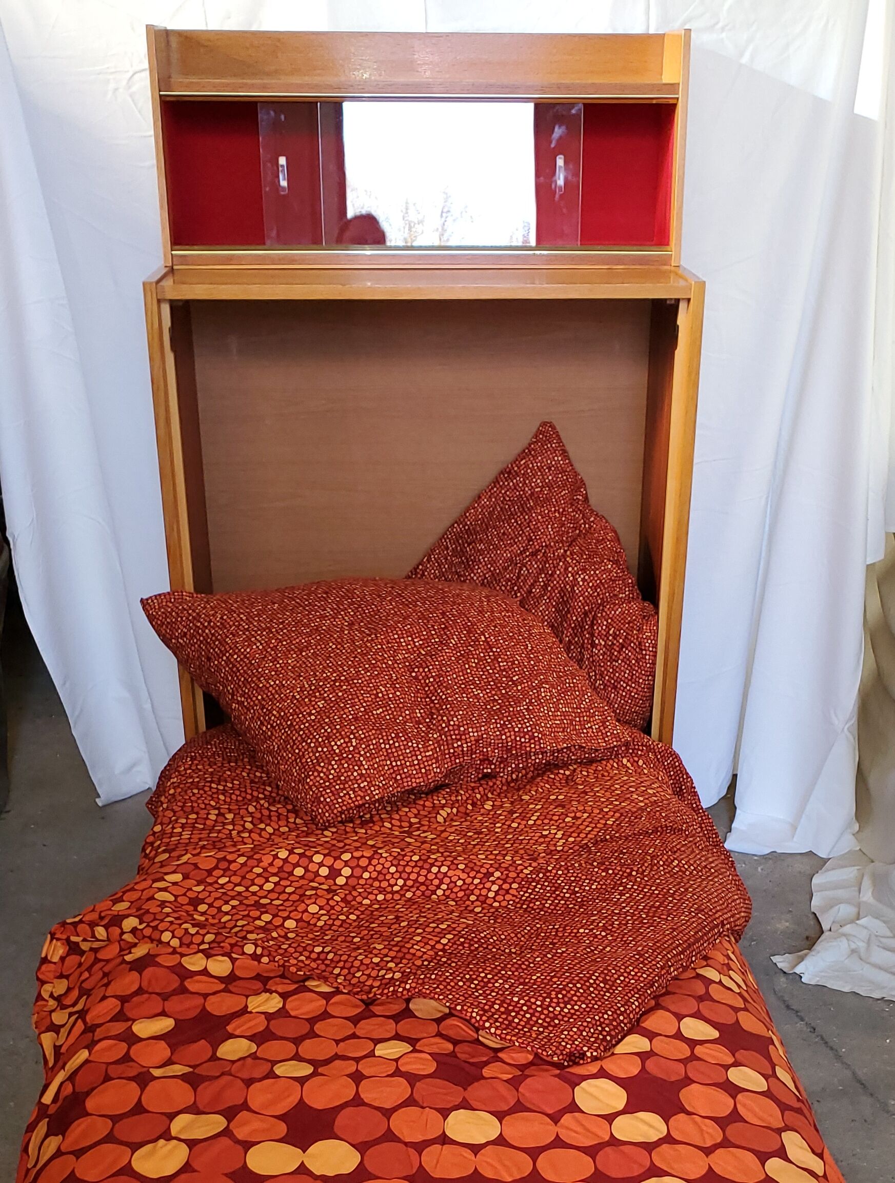 Fold bed in a 60's cabinet
