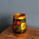 Khokhloma vase, Russian lacquered wood craftsmanship, hand-painted decoration.