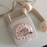 Vintage gray and beige rotary phone