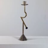 Vintage postmodern sculptural candlestick in chrome brass from the 1980s.
