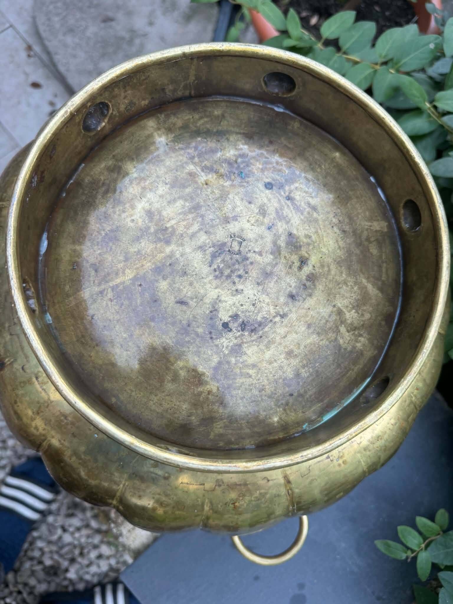 Large brass lion planter with a hallmark from the 19th century.