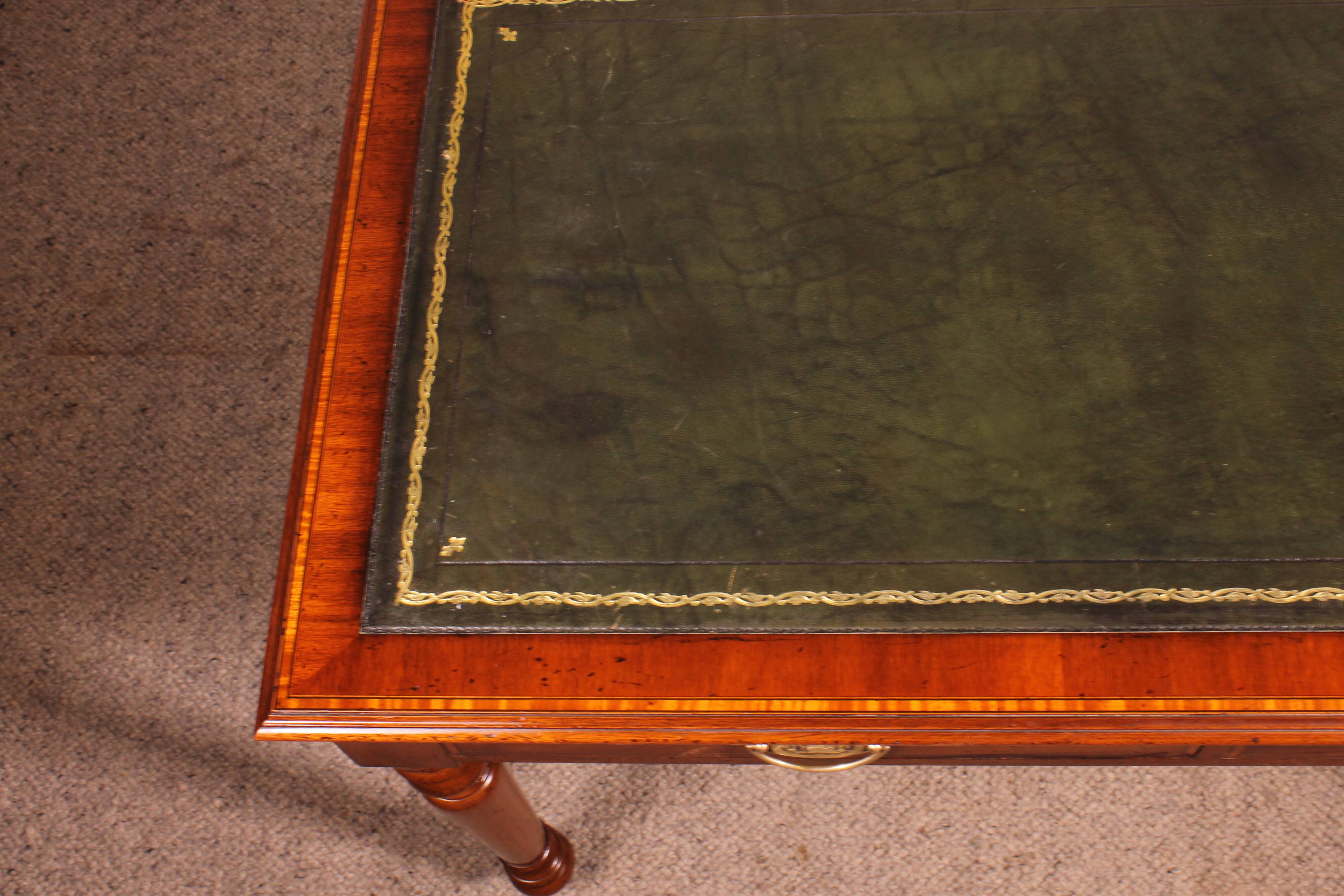 flat desk with two drawers from the 19th century in mahogany and inlays