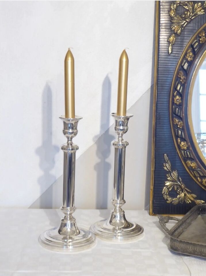 Pair of silver metal candle holders