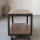 Industrial coffee table in metal and wood, wheeled table, trolley, vintage table, interior decoration.