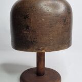 Old solid wood hat shape on foot, 1900