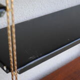 Shelf wall metal string
