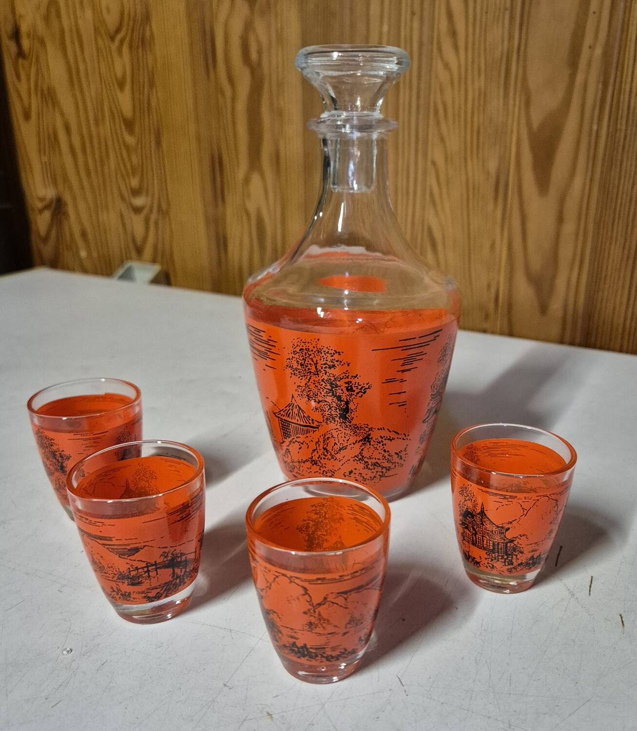 Decorated glass liqueur set, carafe and 4 glasses with asian scene