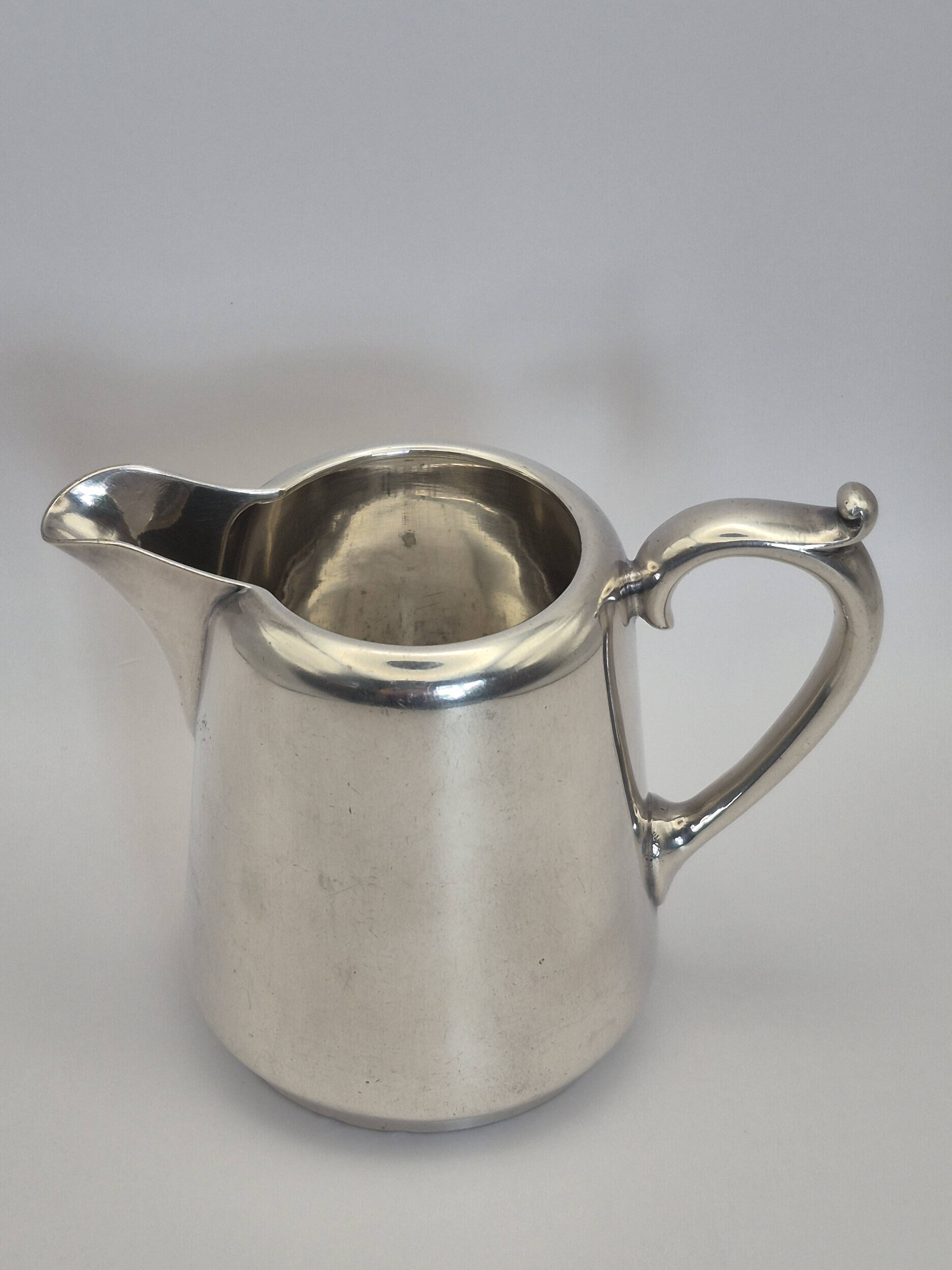 Superb vintage cream jug from the prestigious silversmithing house.