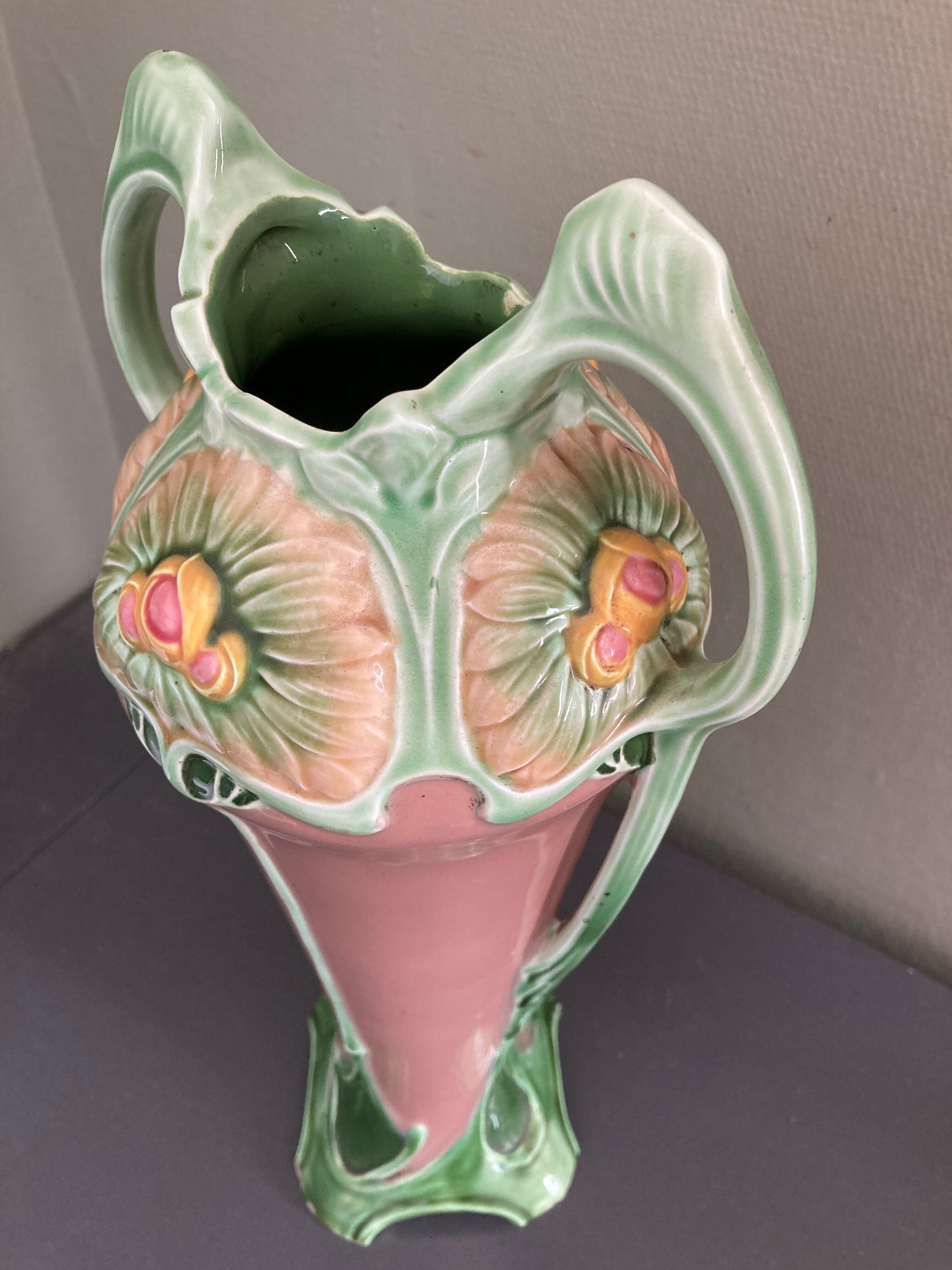 Art-nouveau splashy ceramic vase of flowers