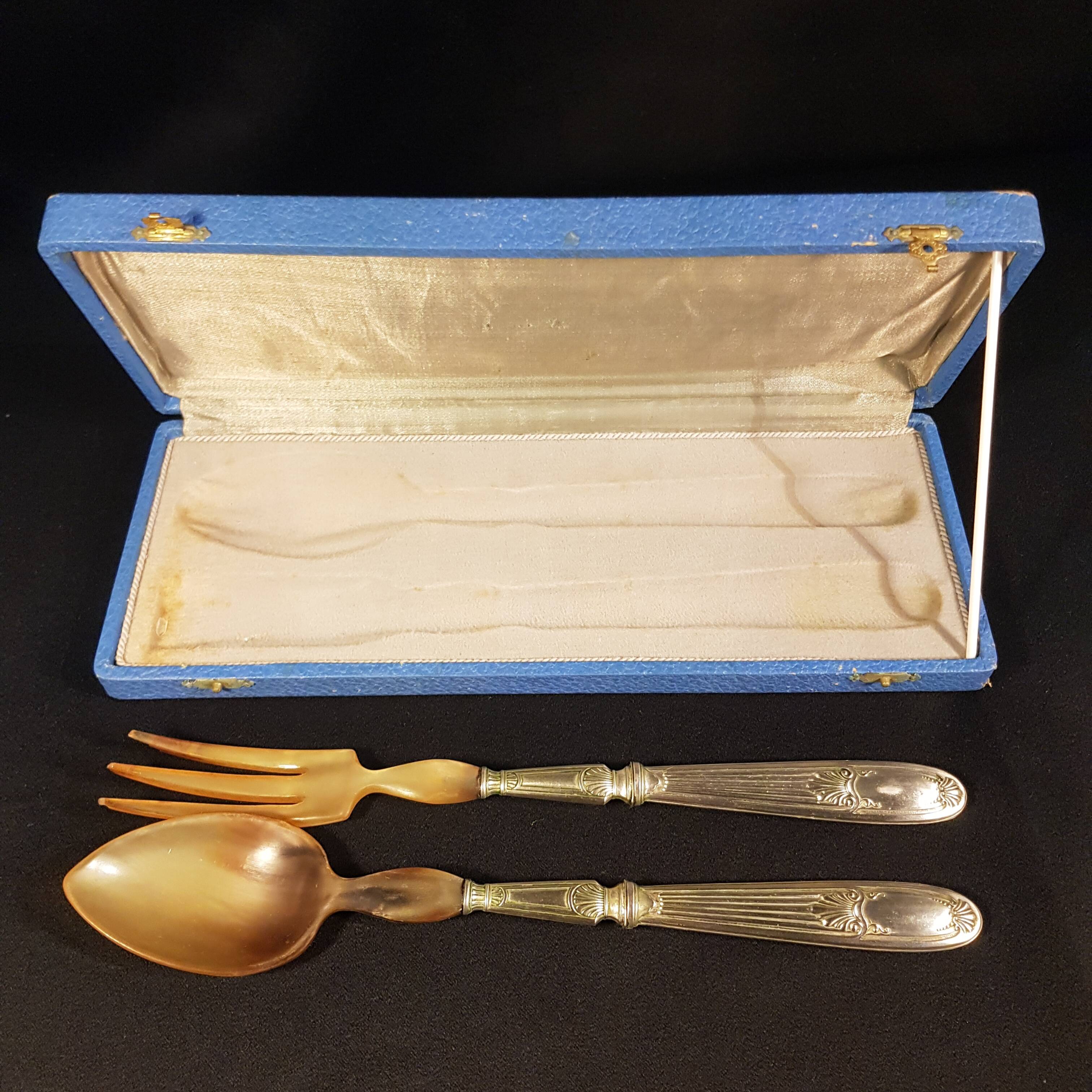 Old salad servers in their case