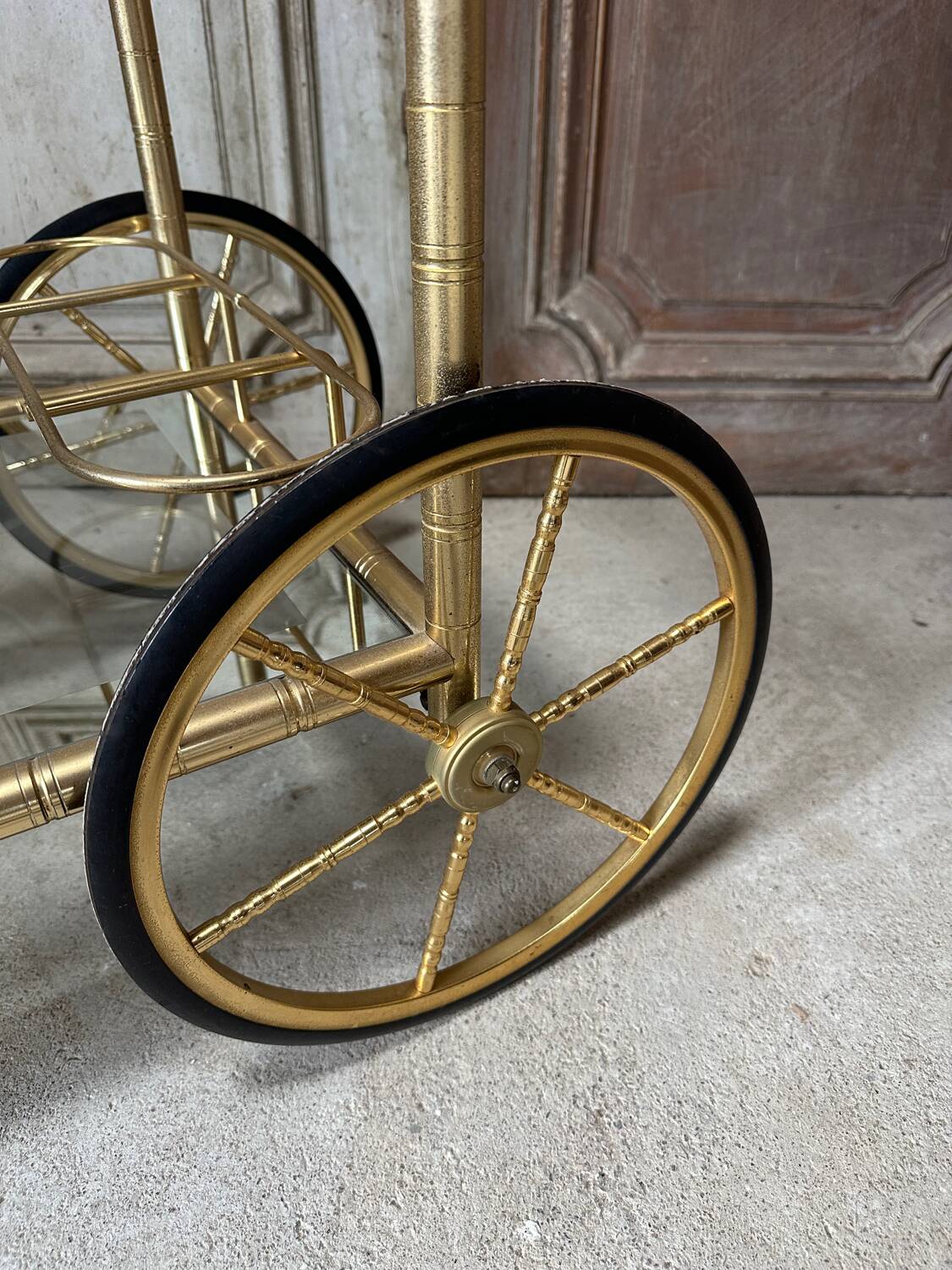 Vintage gold bar cart serving trolley