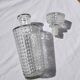 Old relief glass carafe with stopper
