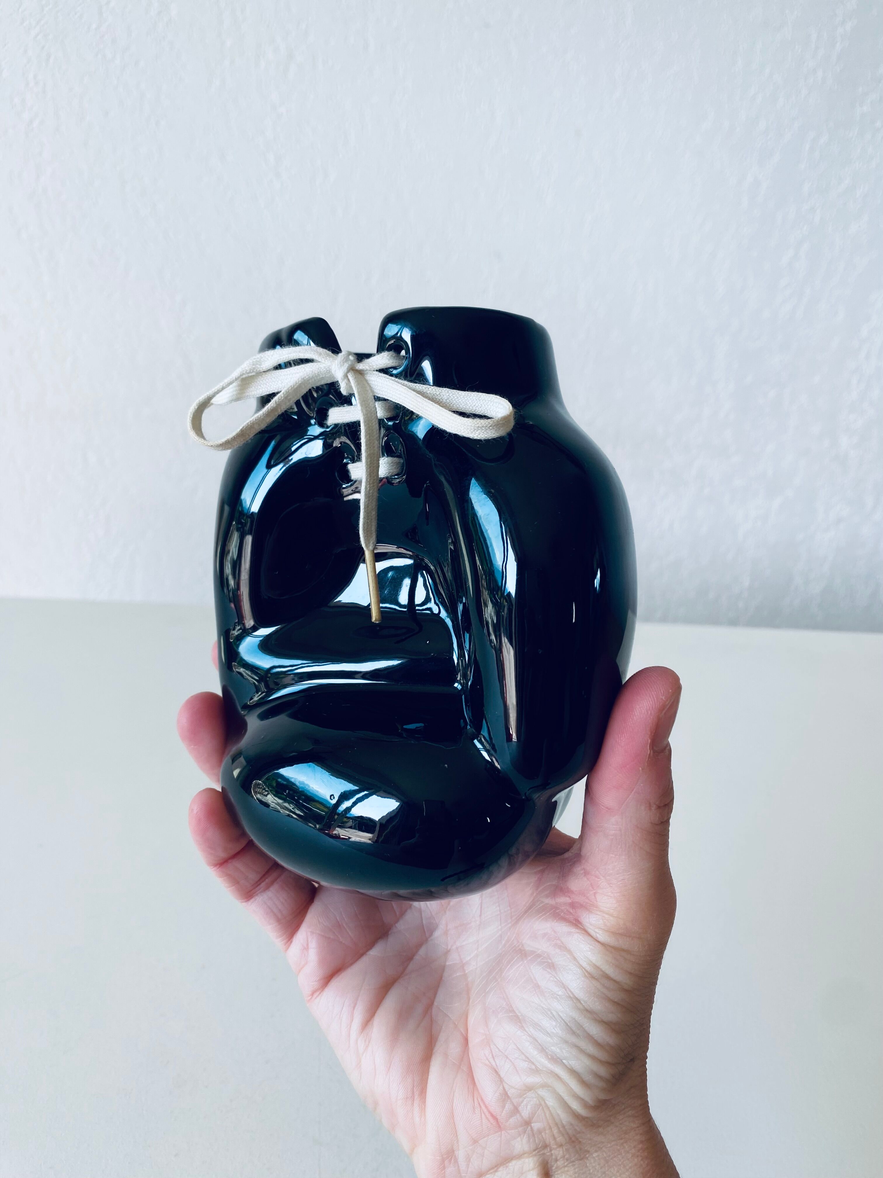 Empty pocket ceramic boxing glove