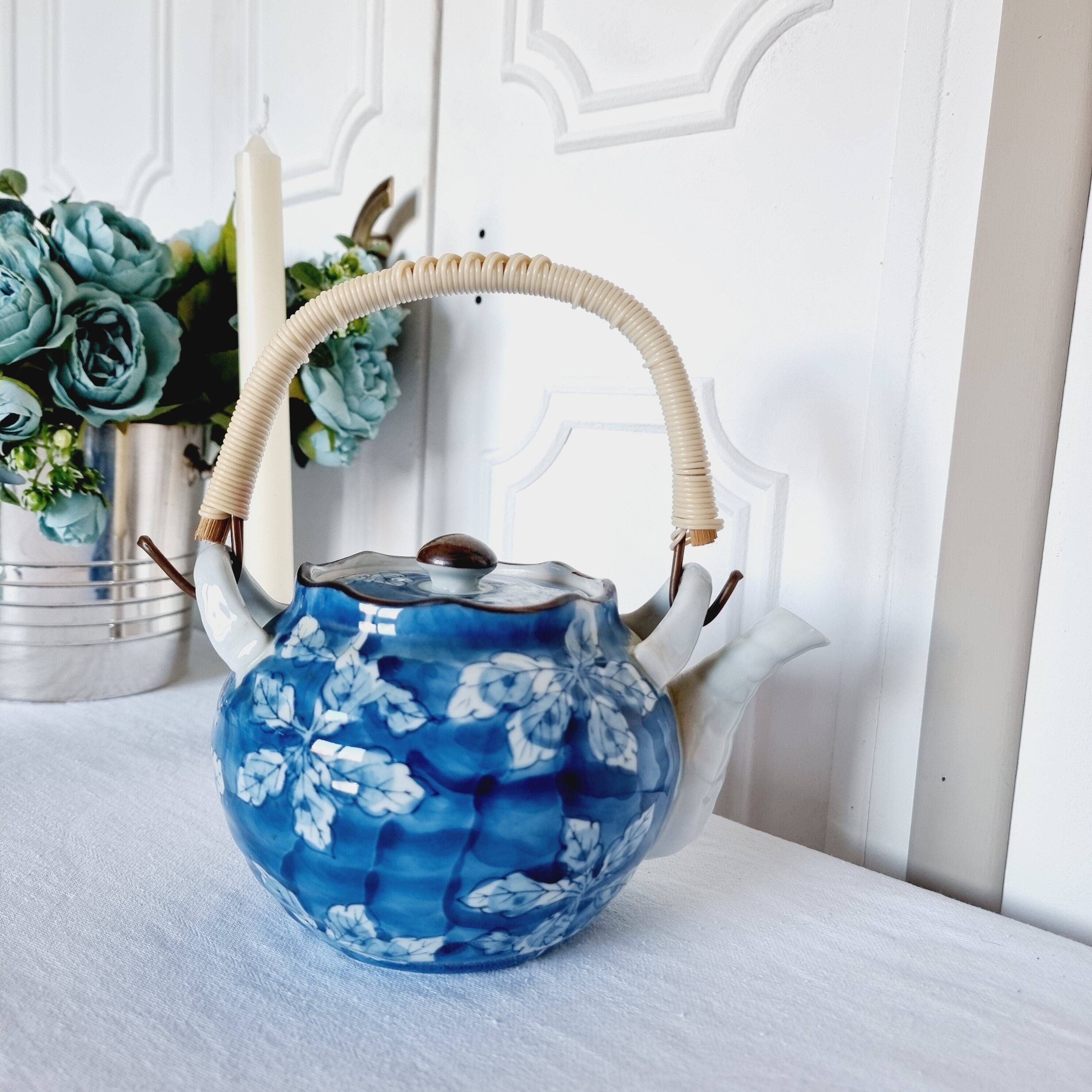 Handcrafted Japanese porcelain teapot hand painted in blue and white.