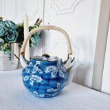 Handcrafted Japanese porcelain teapot hand painted in blue and white.