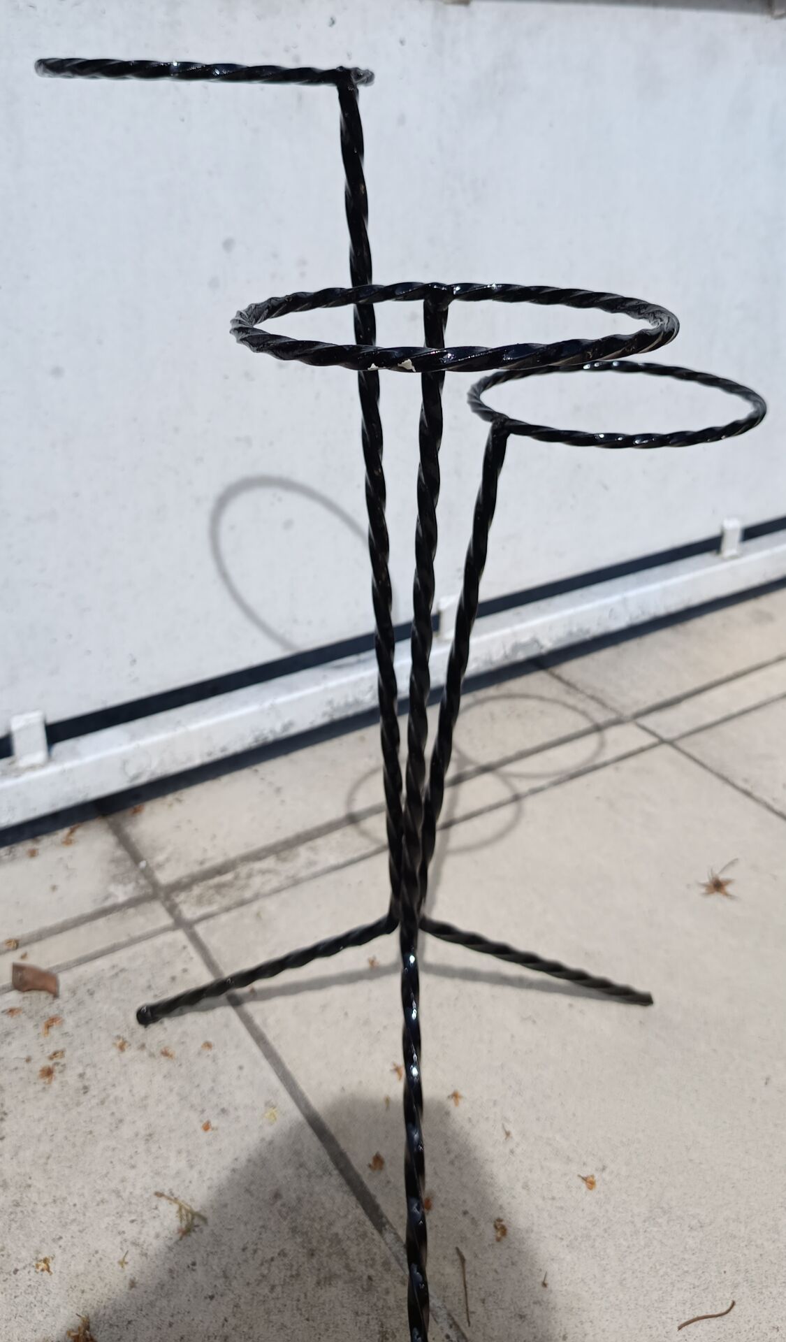 Wrought iron plant stand from the 1950s.