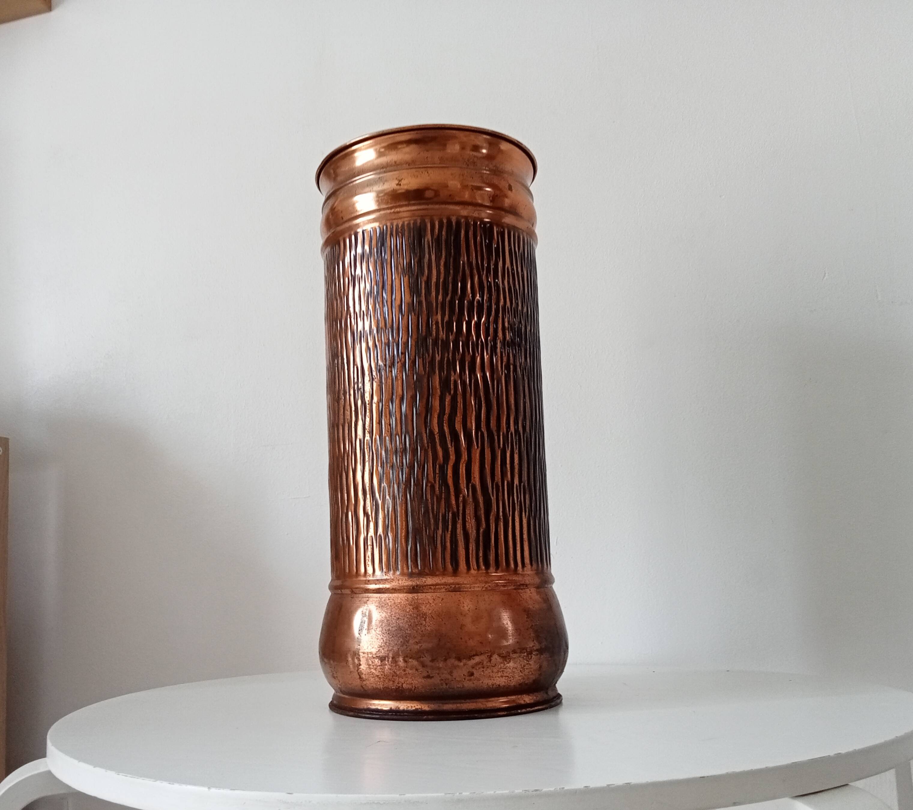 Vintage brutalist umbrella stand in hammered copper with a wood effect.