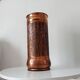 Vintage brutalist umbrella stand in hammered copper with a wood effect.